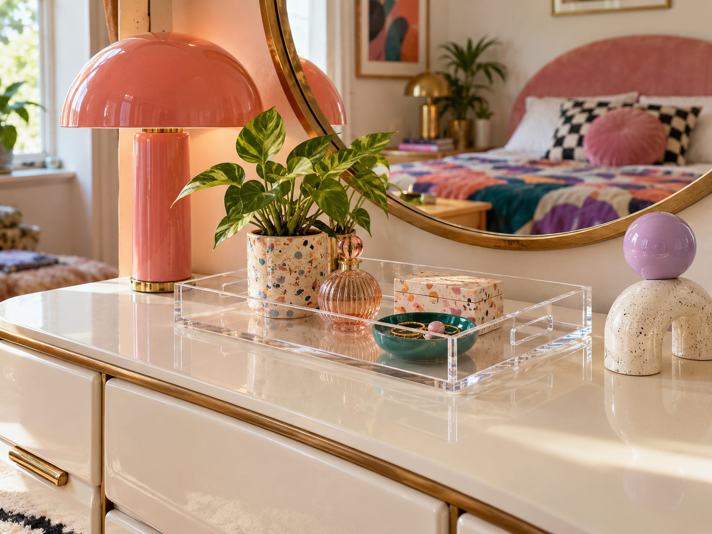 Clear acrylic tray on a bedroom dresser