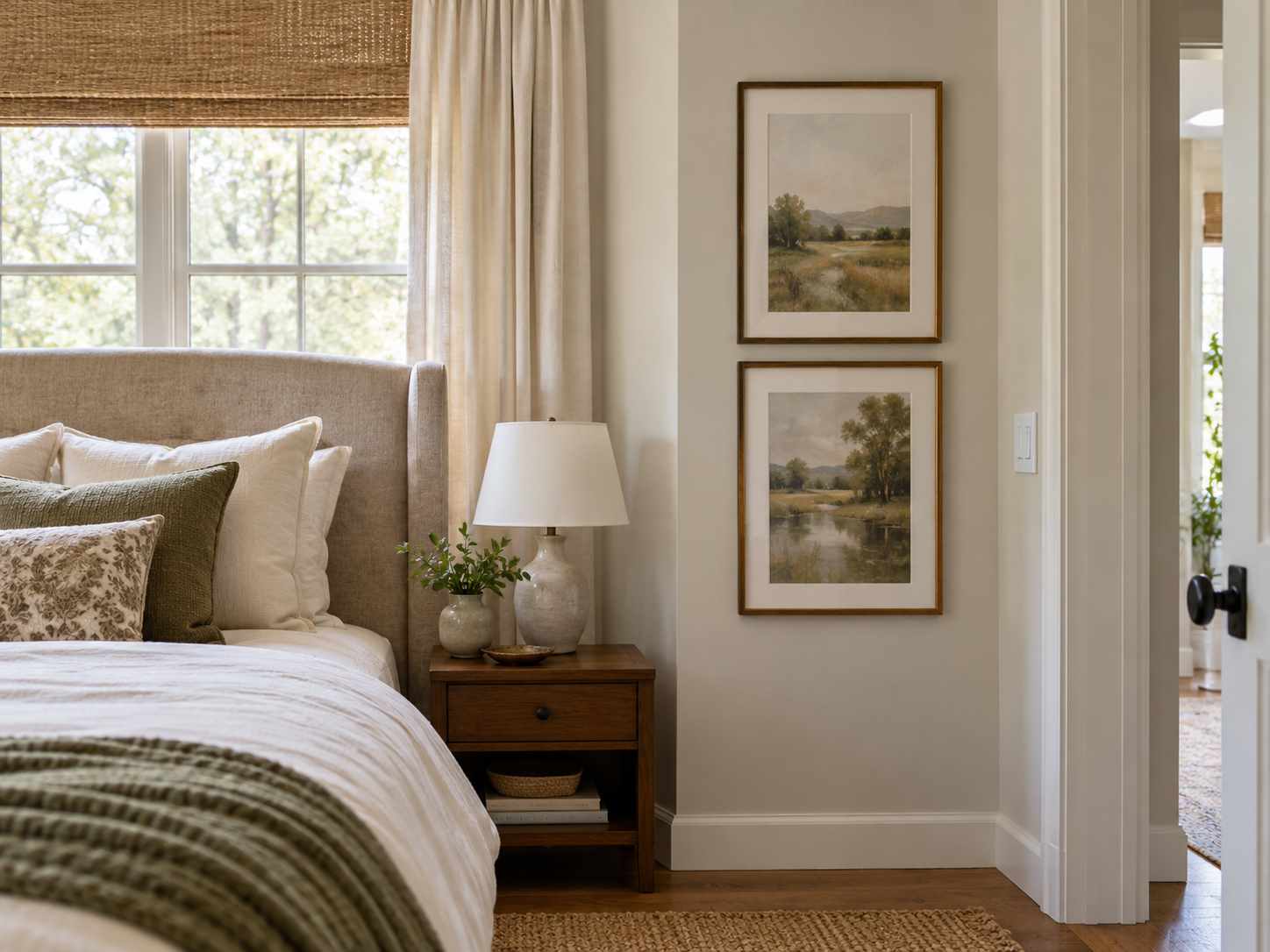 Vertical print pair on a narrow bedroom wall